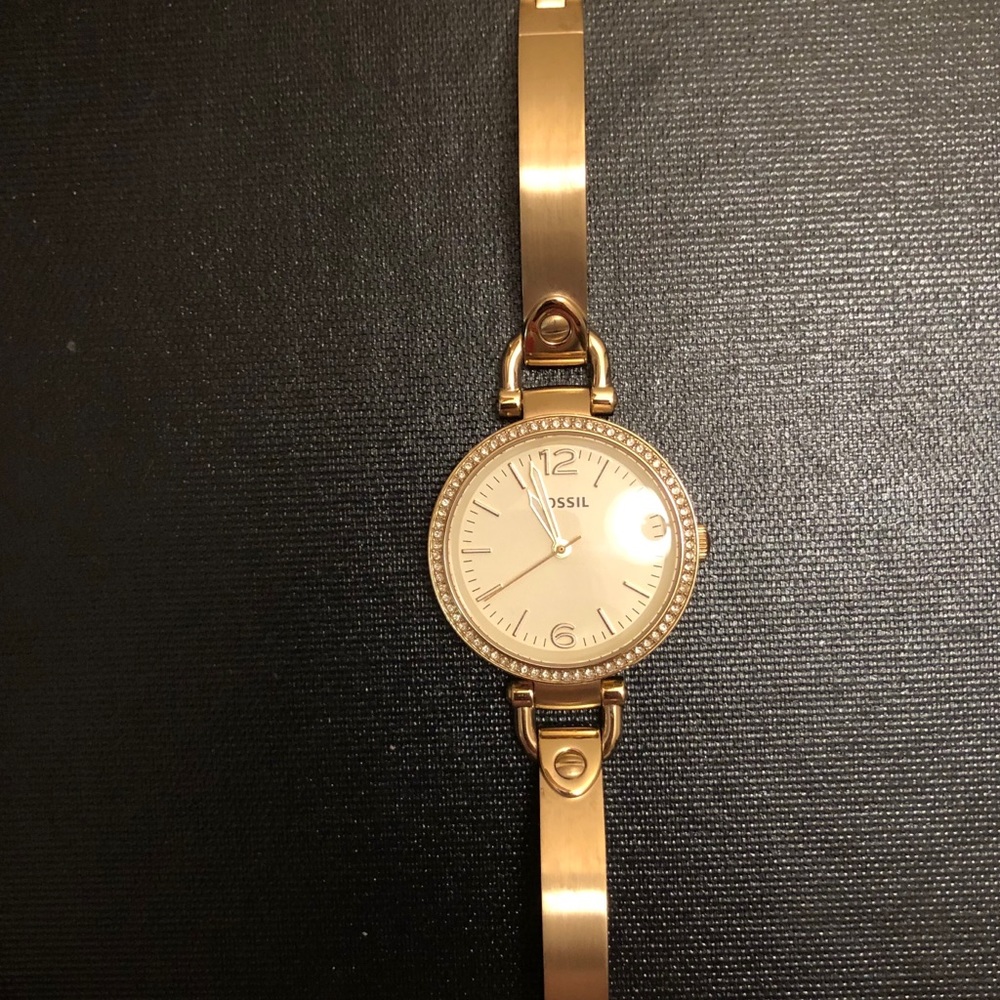 Gold fossil watch